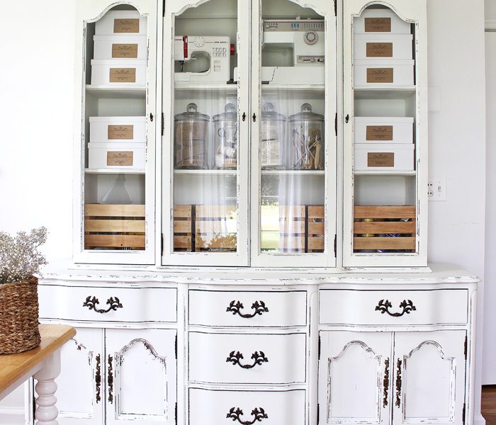 Old hutches and china cabinets make great storage for an office! See how this outdated piece gets transformed at LoveGrowsWild.com