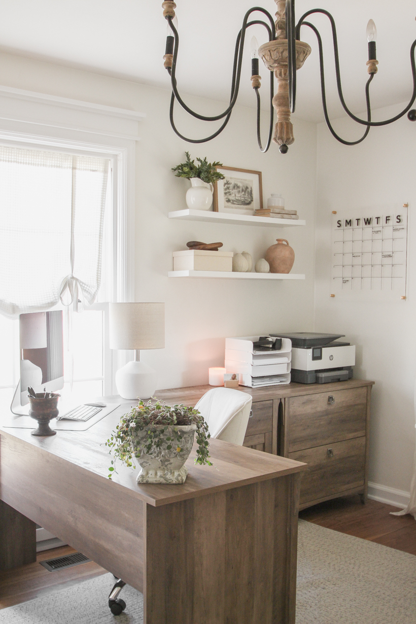 Home blogger and interior decorator Liz Fourez shares her home office that features antique furniture as the perfect storage pieces for her business.