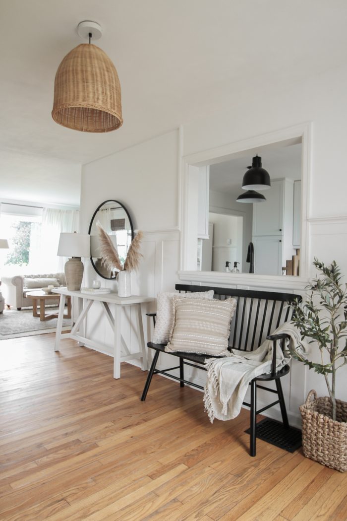 A beautiful neutral entryway shared by home blogger and interior decorator Liz Fourez